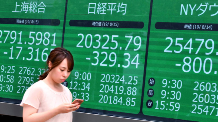 Asian stocks track Wall St records as Fed revives rate hopes