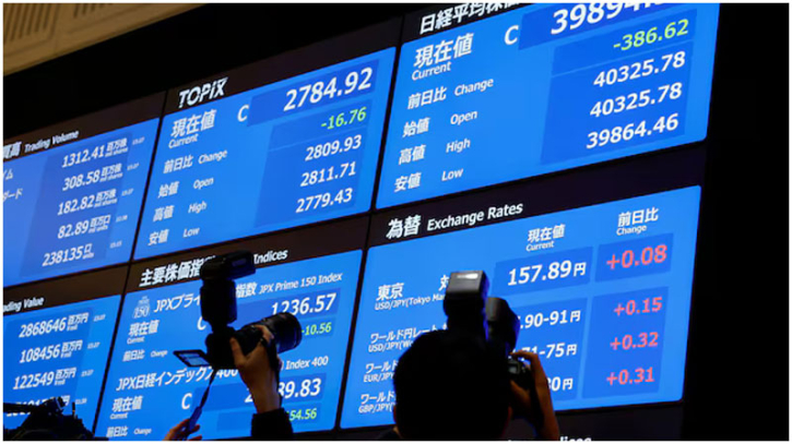 Asian stocks wary, dollar upbeat before data deluge