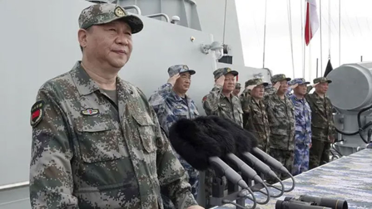 China boosts military budget while warning of escalating threats