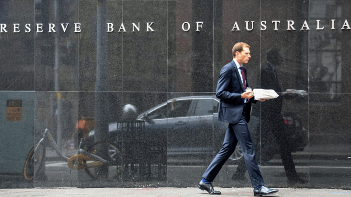 Australia lifts key interest rate, flags further rises