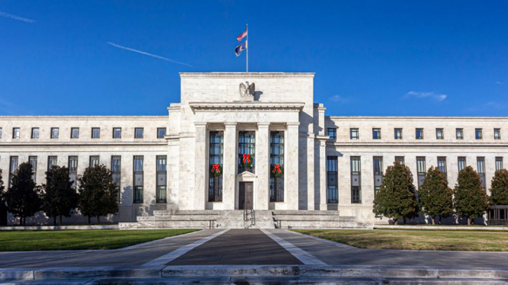 Federal reserve holds key rate, still sees 3 cuts this year